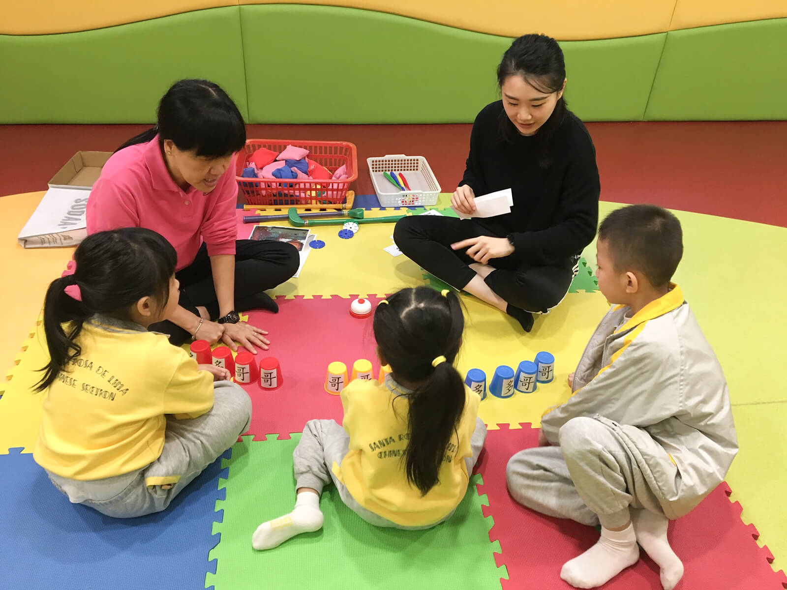 Students playing games to learn new words during small group intervention sessions