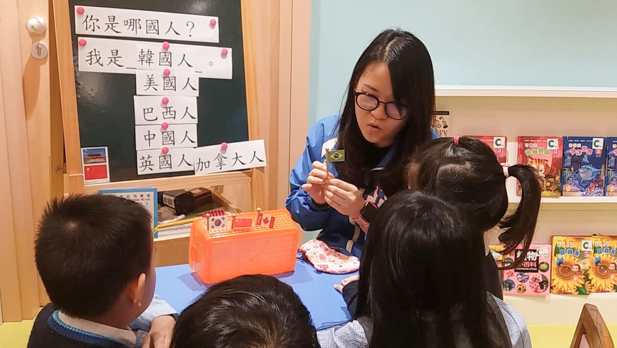 Teacher uses props to demonstrate particular sentence structures to students during the intervention session 